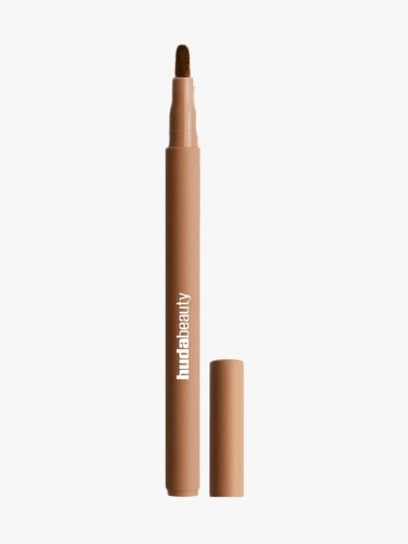 Huda Beauty Lip Contour Lip Stain for 12-Hour Wear in branded component on a light gray background